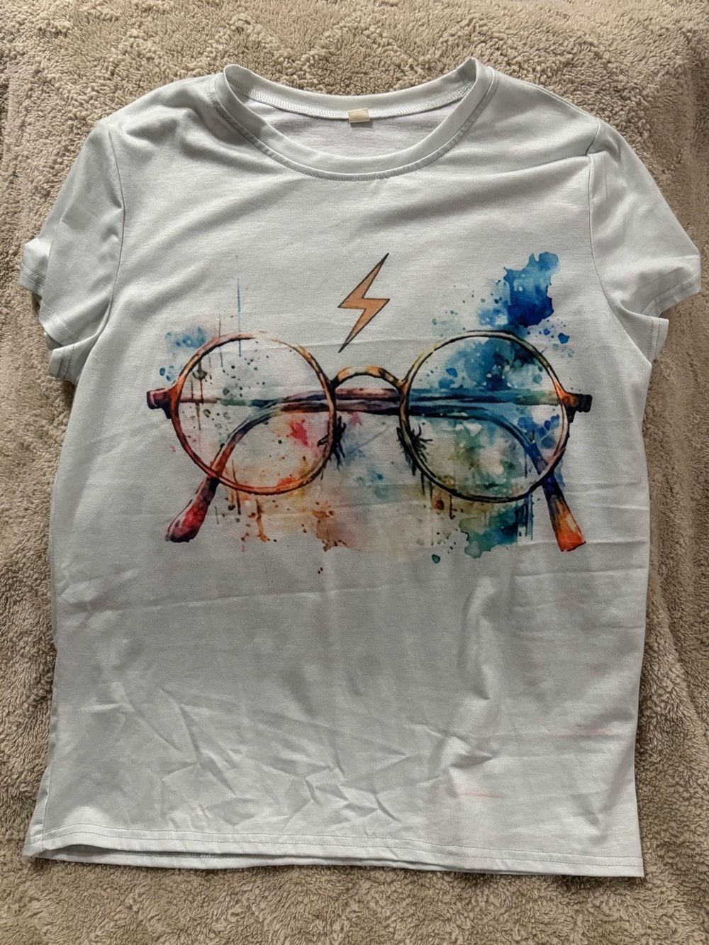 Light blue HP themed tee, never worn, super soft